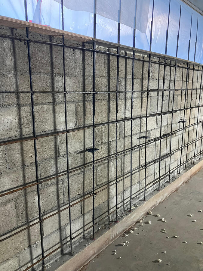 Reinforcement installed along the wall at UH Sinclair Library